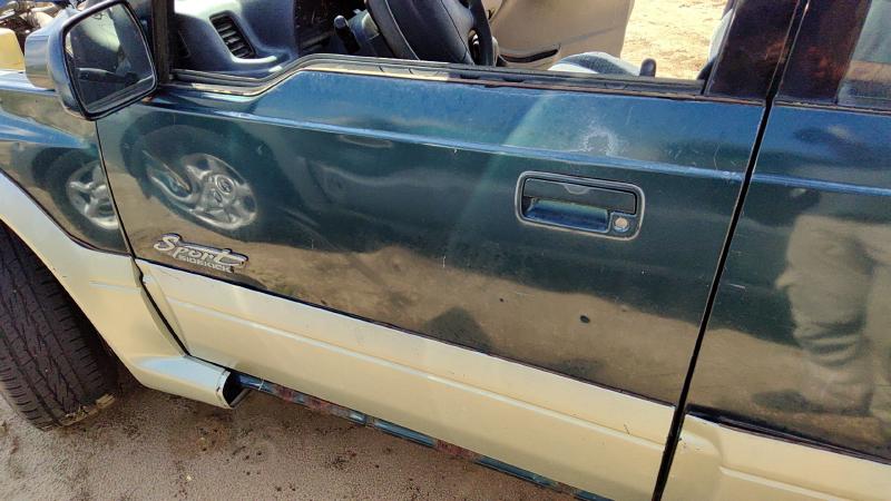 1996-1998 Suzuki Sidekick Front Door LH