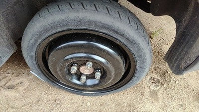 1991-2002 Saturn SL1 14 compact spare wheel with Tire mini donut OEM 21010407