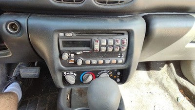 2000-2005 Pontiac Sunfire Trim Bezel Around Radio Surround Dash Panel Oem