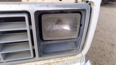 1979-1991 Ford Van E250 Driver Left Headlight Door Trim Surround Panel Oem