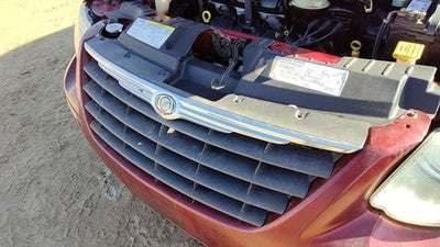 05-07 Town & Country Front Grille Oem Chrome With Top Plastic 4857957Aa