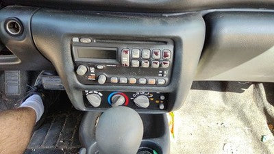 2000-2005 Pontiac Sunfire Trim Bezel Around Radio Surround Dash Panel Oem