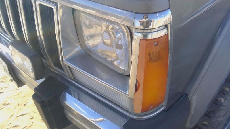 1984-1992 Jeep Cherokee Headlight Door LH