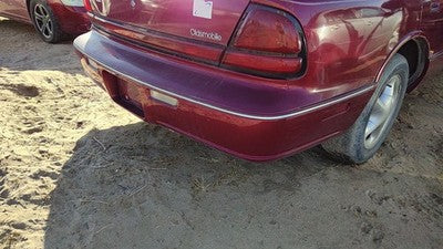 1996-1999 Olds 88 Rear Bumper Cover Assembly Oem Back Red 25644010
