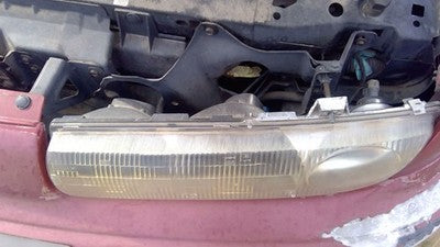 1996-1999 Saturn Sw2 Driver Left Head Light Oem Front Lamp With Bracket 21111169