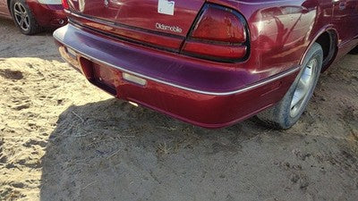1996-1999 Olds 88 Rear Bumper Cover Assembly Oem Back Red 25644010