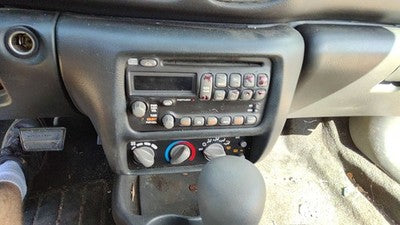 2000-2005 Pontiac Sunfire Trim Bezel Around Radio Surround Dash Panel Oem