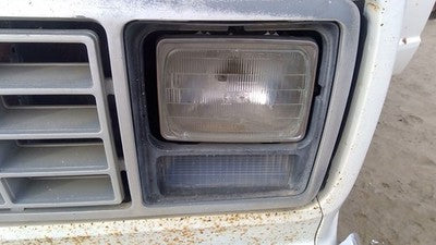 1979-1991 Ford Van E250 Driver Left Headlight Door Trim Surround Panel Oem