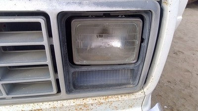1979-1991 Ford Van E250 Driver Left Headlight Door Trim Surround Panel Oem