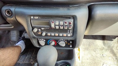 2000-2005 Pontiac Sunfire Trim Bezel Around Radio Surround Dash Panel Oem