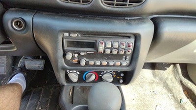 2000-2005 Pontiac Sunfire Trim Bezel Around Radio Surround Dash Panel Oem