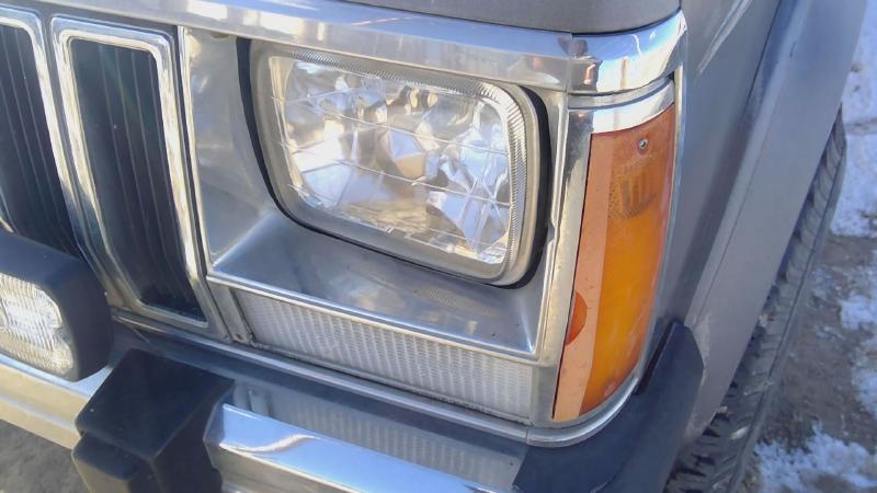1984-1992 Jeep Cherokee Headlight Door LH
