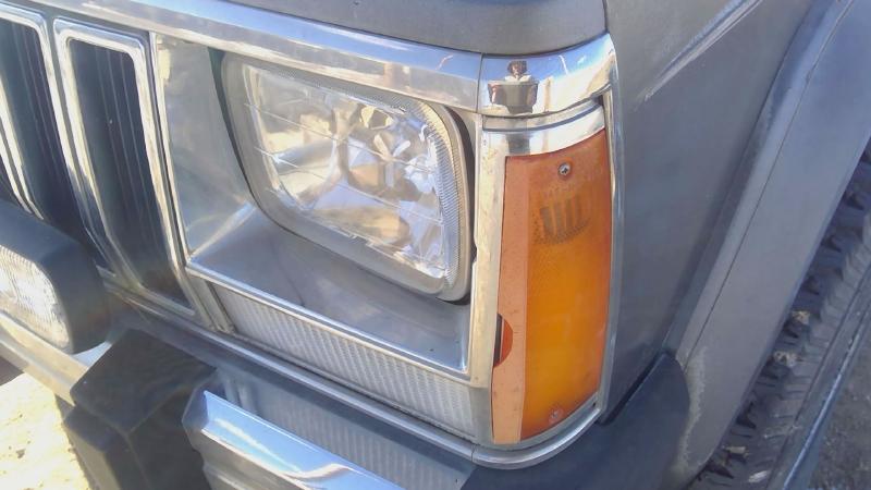 1984-1992 Jeep Cherokee Headlight Door LH