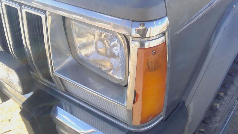 1984-1992 Jeep Cherokee Headlight Door LH
